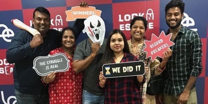 Group celebrating at LockNEscape, the highest rated escape room in Hyderabad, after completing a thrilling 80-minute adventure.