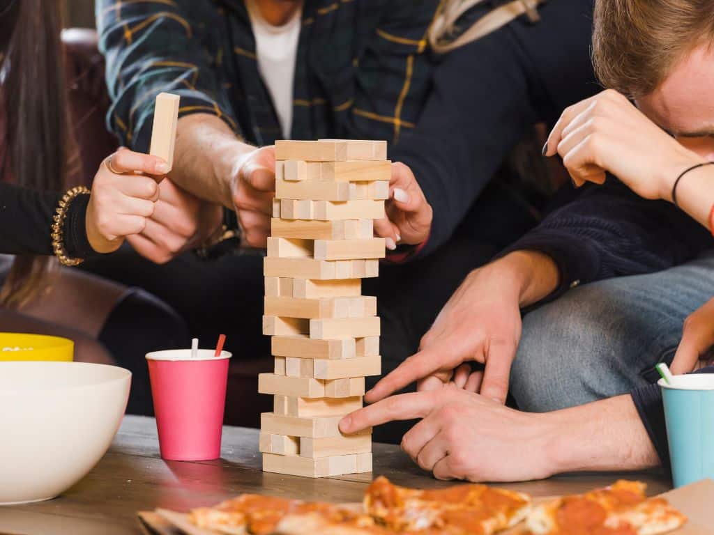 Friends solving puzzles in an escape room