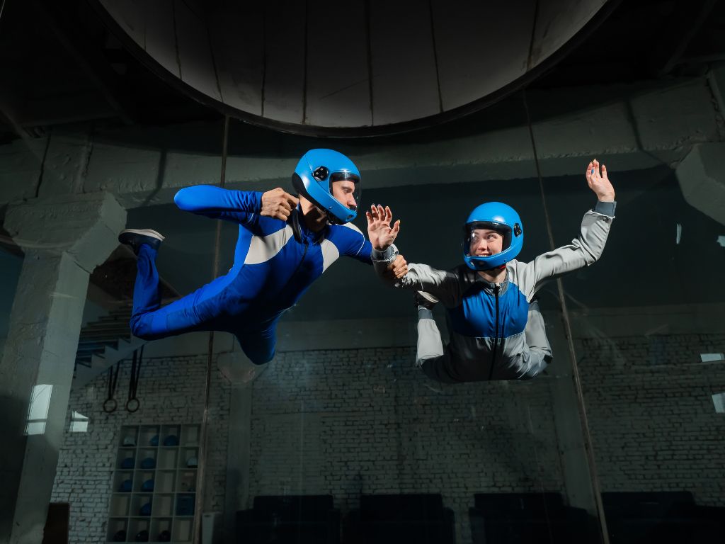 Two people enjoying indoor skydiving experience at GravityZip in Hyderabad