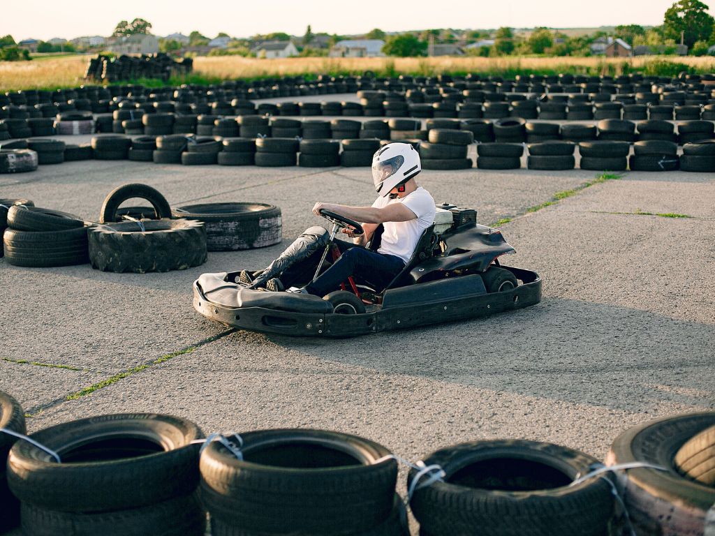 man karting circuit with car